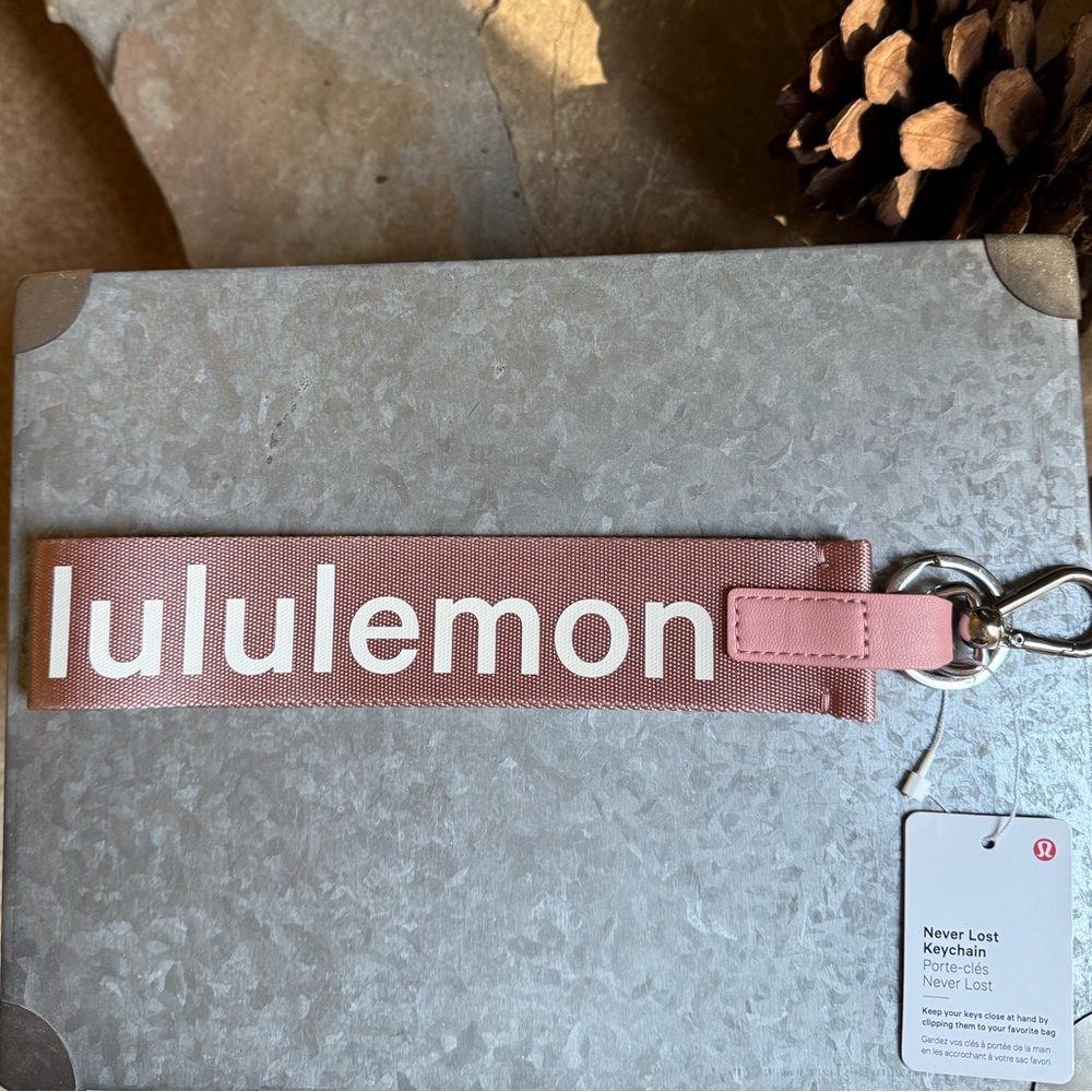 RARE! Lululemon Never Lost Keychain